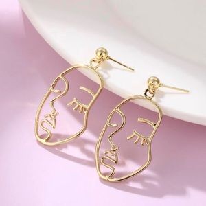 Gold Face drop earrings